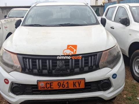 Pick up de marque Mitsubishi à l'état neuf parfait pour tout déplacement en dehors et à l'intérieur de la ville de Yaoundé